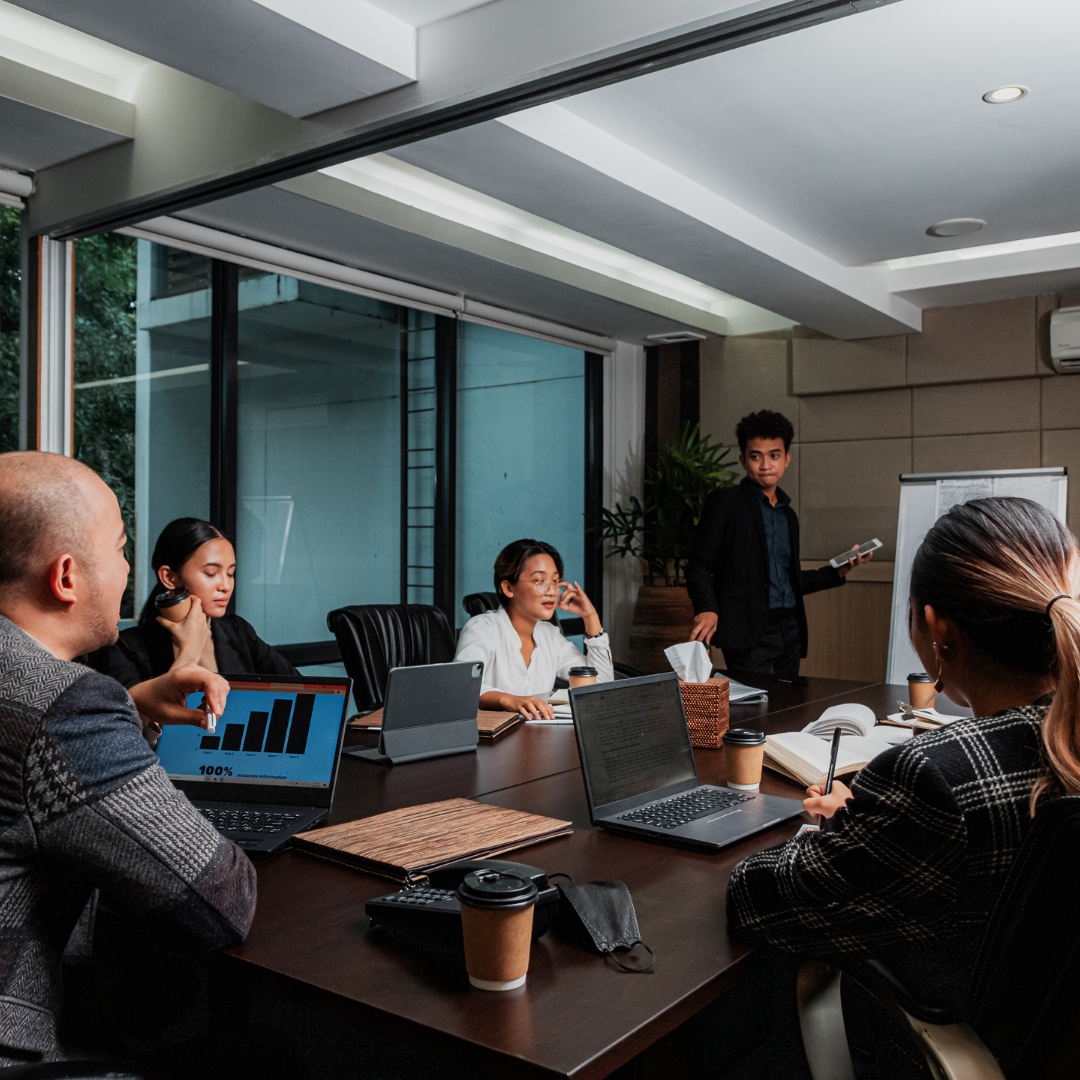 A diverse team of professionals collaborating in a modern office